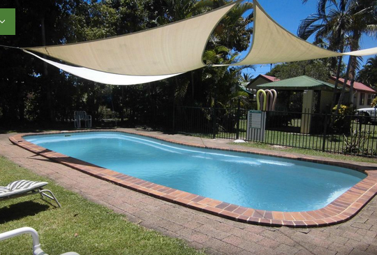Swimming pool at Flying Fish Point tourist Park, Queensland, Australia. 